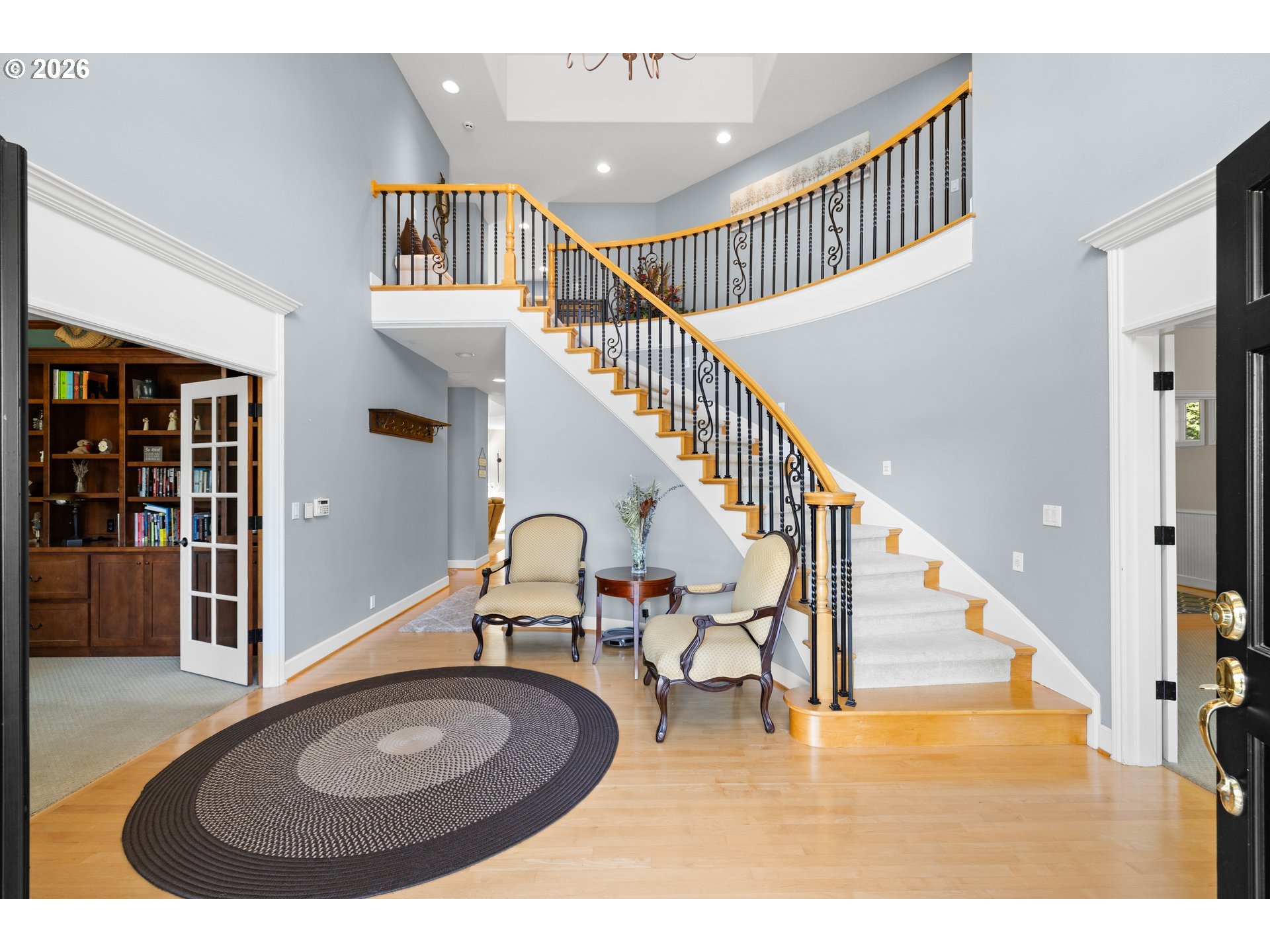 2633 Southeast Vista Way Gresham, OR 97080 - Photo 5 of 48 a view of a livingroom with furniture and staircase