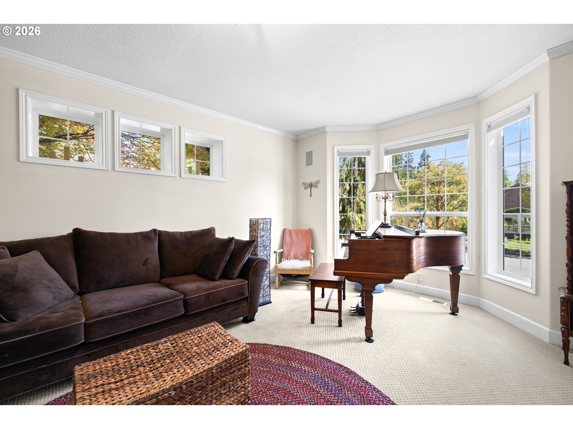 2633 Southeast Vista Way Gresham, OR 97080 - Photo 8 of 48 a living room with furniture and a large window