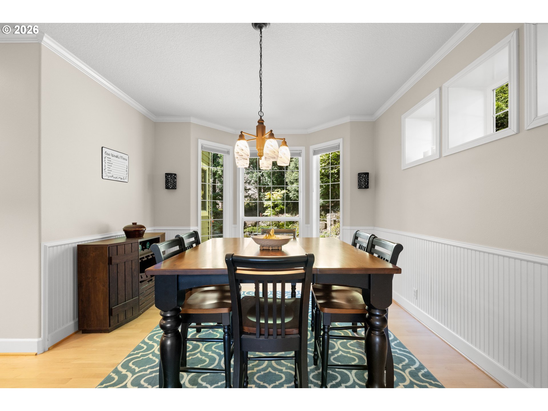 2633 Southeast Vista Way Gresham, OR 97080 - Photo 10 of 48 a view of a dining room with furniture window and outside view