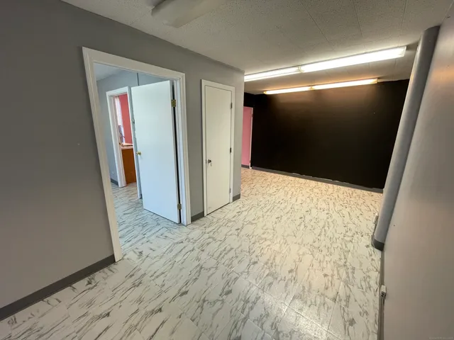 a room with furniture and window