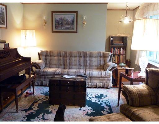 722 Bell Point Road Apollo, PA 15613 - Photo 2 of 12 Living Room. Hardwood floors are under the carpet in this comfortable living room with small study alcove.