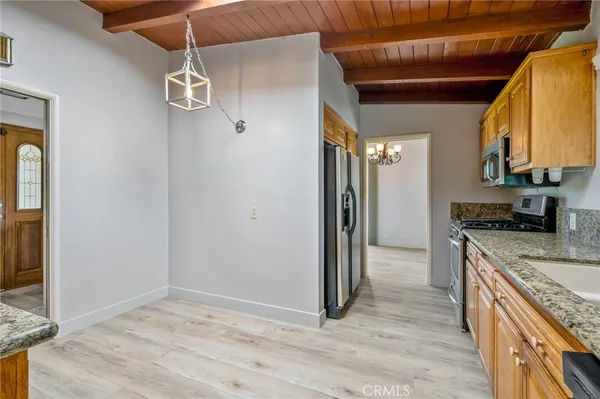 a view of a kitchen and a sink