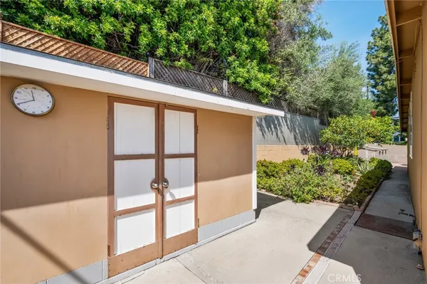 a house view with a backyard space