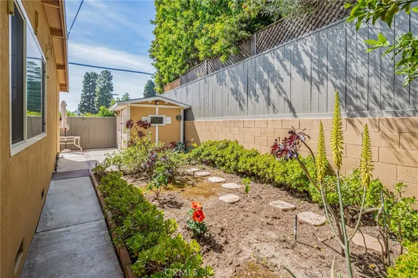 a backyard of a house with lots of green space