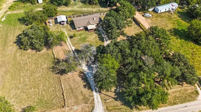 a view of a lake with a tree