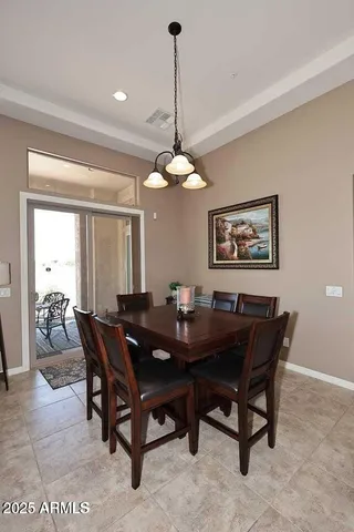 a view of a dining room with furniture