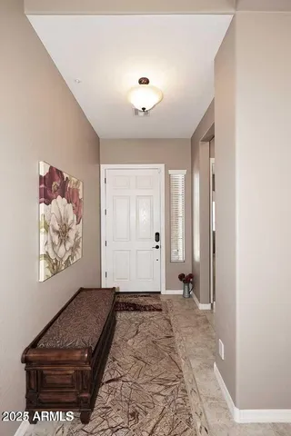 a view of an empty room and window