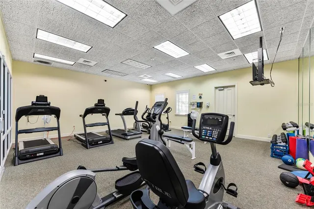 a view of a room with gym equipment