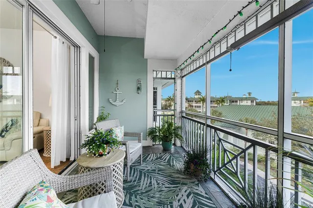 a view of balcony with furniture