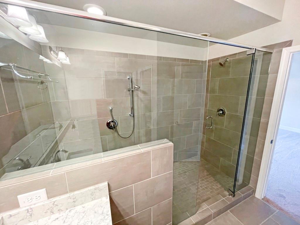 4129 Townsend Lane Dunwoody, GA 30346 - Photo 21 of 38 a bathroom with a shower and a sink