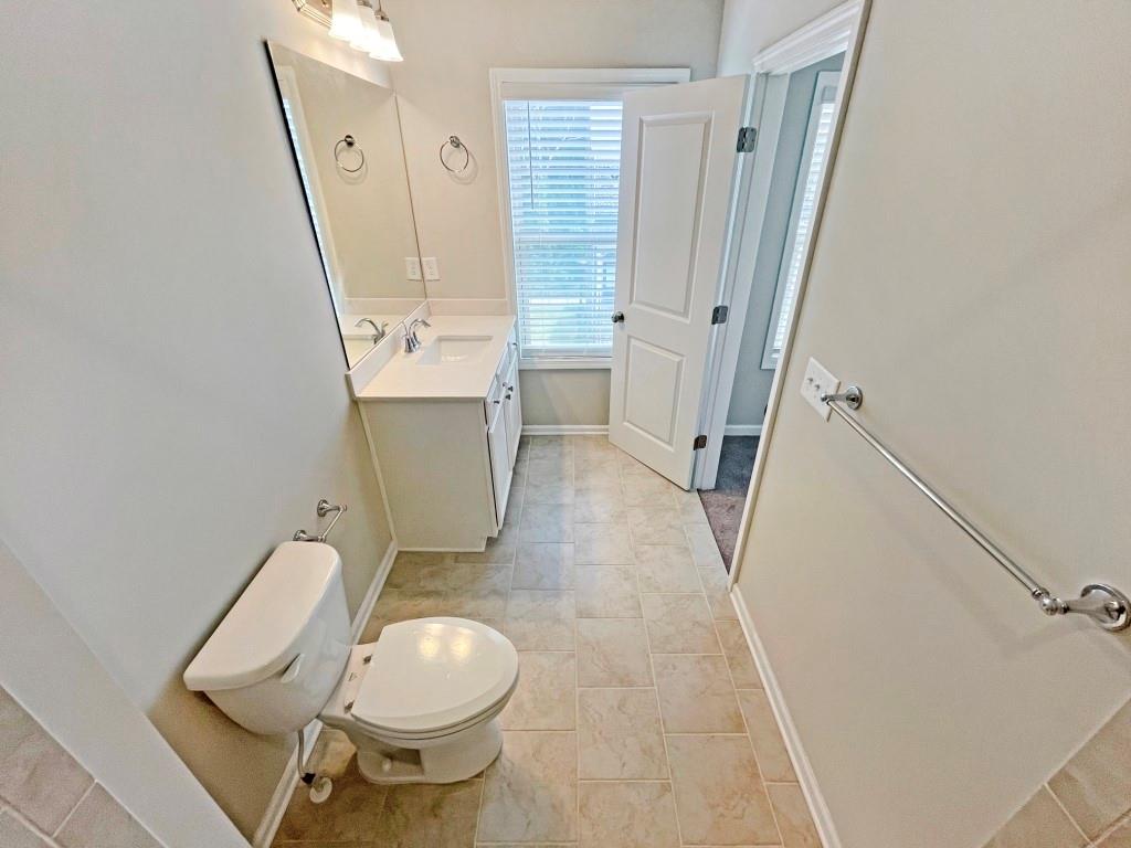 4129 Townsend Lane Dunwoody, GA 30346 - Photo 29 of 38 a bathroom with a sink toilet and shower