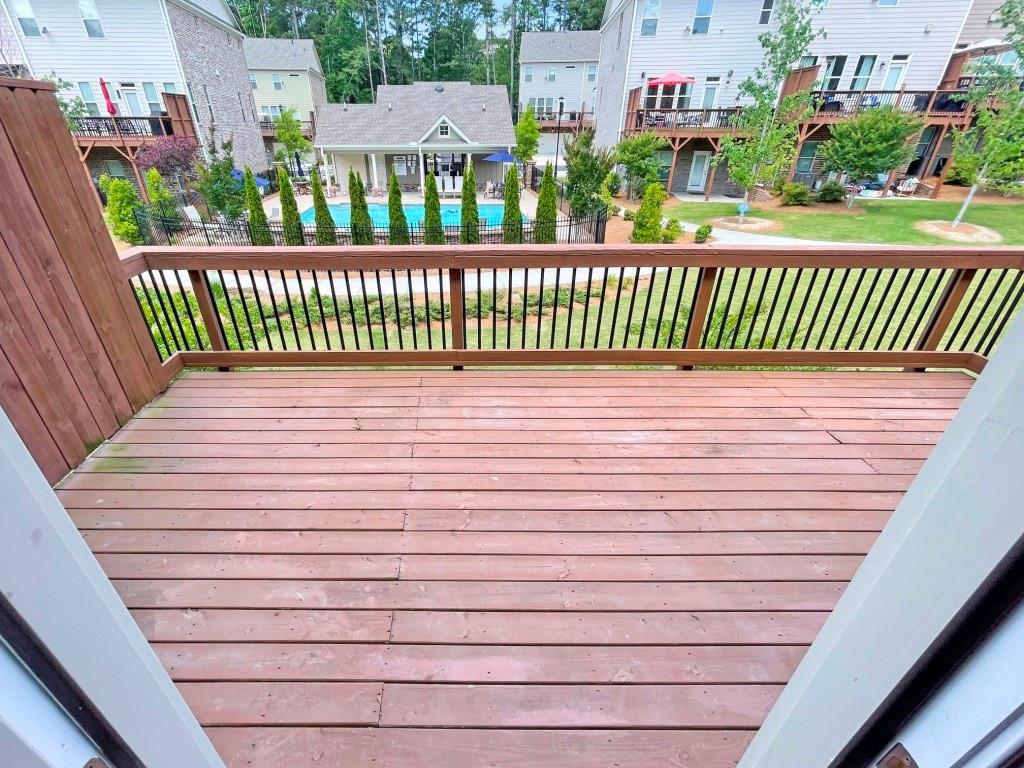 4129 Townsend Lane Dunwoody, GA 30346 - Photo 37 of 38 a street view with wooden fence