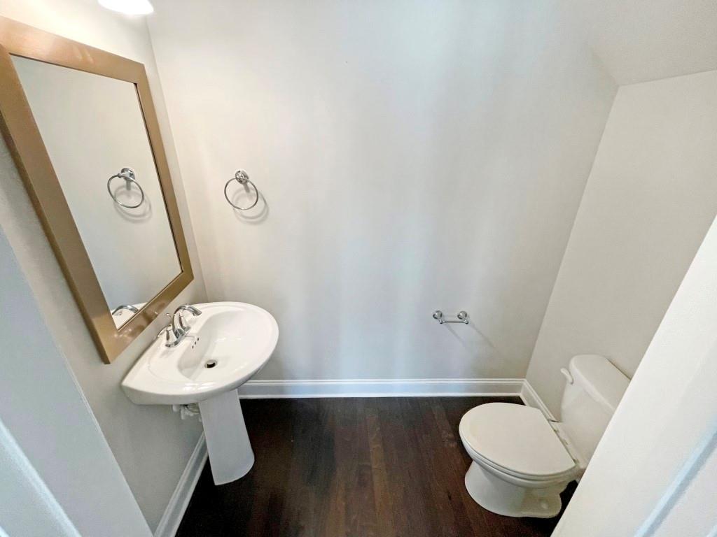 4129 Townsend Lane Dunwoody, GA 30346 - Photo 10 of 38 a bathroom with a sink mirror vanity and toilet