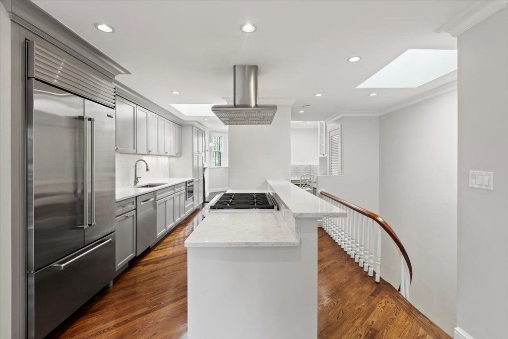 54 Appleton Street, Unit 4 Boston, MA 02116 - Photo 2 of 20 a kitchen with stainless steel appliances granite countertop a refrigerator a sink and a stove