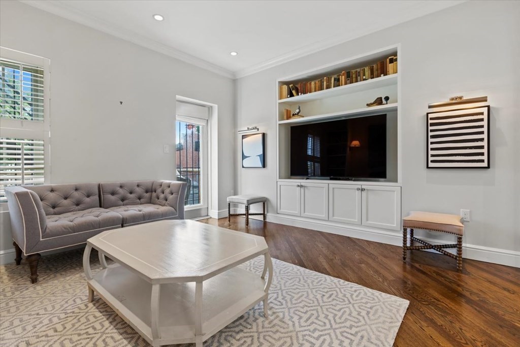 54 Appleton Street, Unit 4 Boston, MA 02116 - Photo 6 of 20 a living room with furniture and a flat screen tv