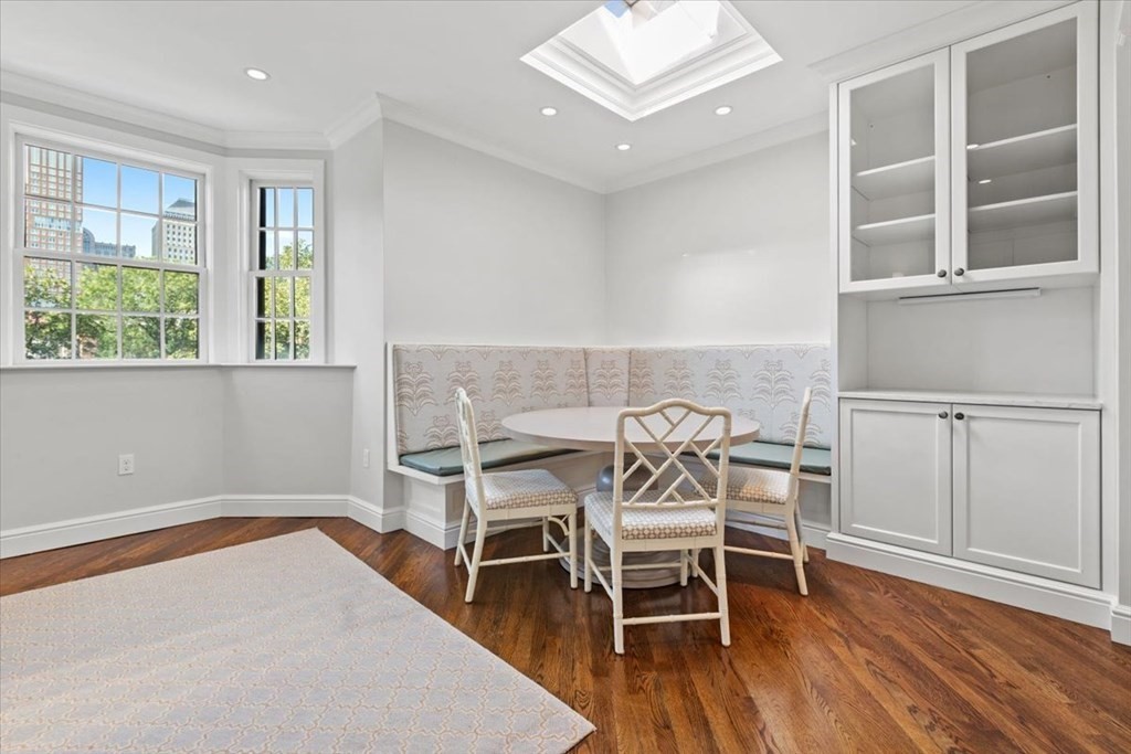 54 Appleton Street, Unit 4 Boston, MA 02116 - Photo 7 of 20 a view of a dining room with furniture and wooden floor
