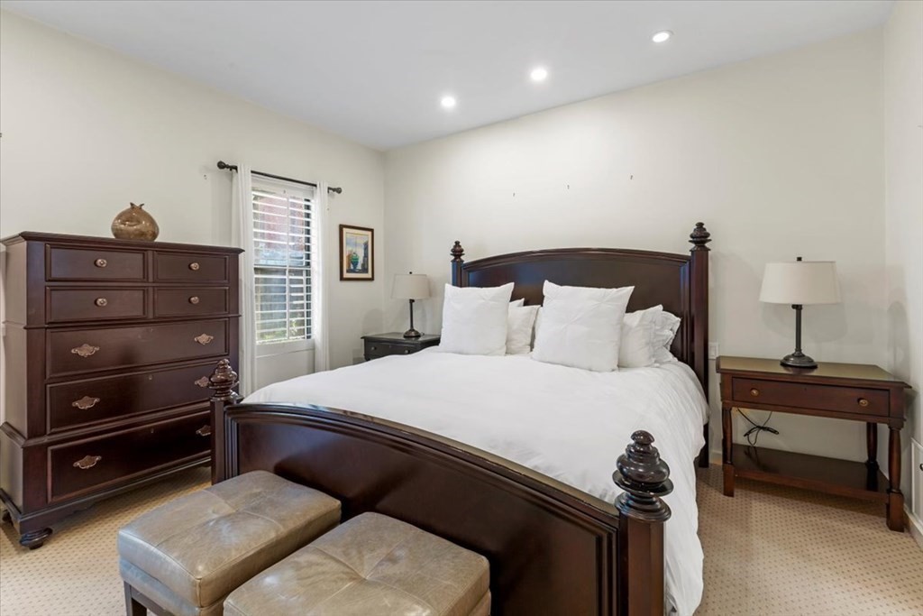 54 Appleton Street, Unit 4 Boston, MA 02116 - Photo 10 of 20 a bed room with a bed and a television