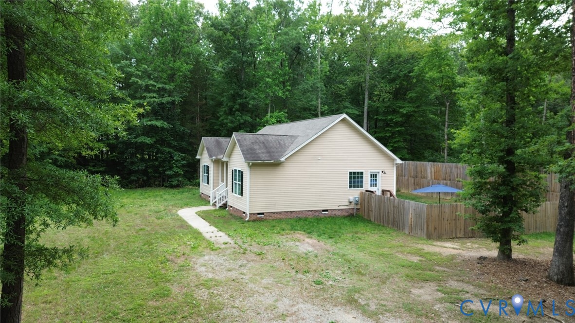 2406 Emanuel Church Road Powhatan, VA 23139 - Photo 37 of 48 Light beige single-story home featuring a gray shi