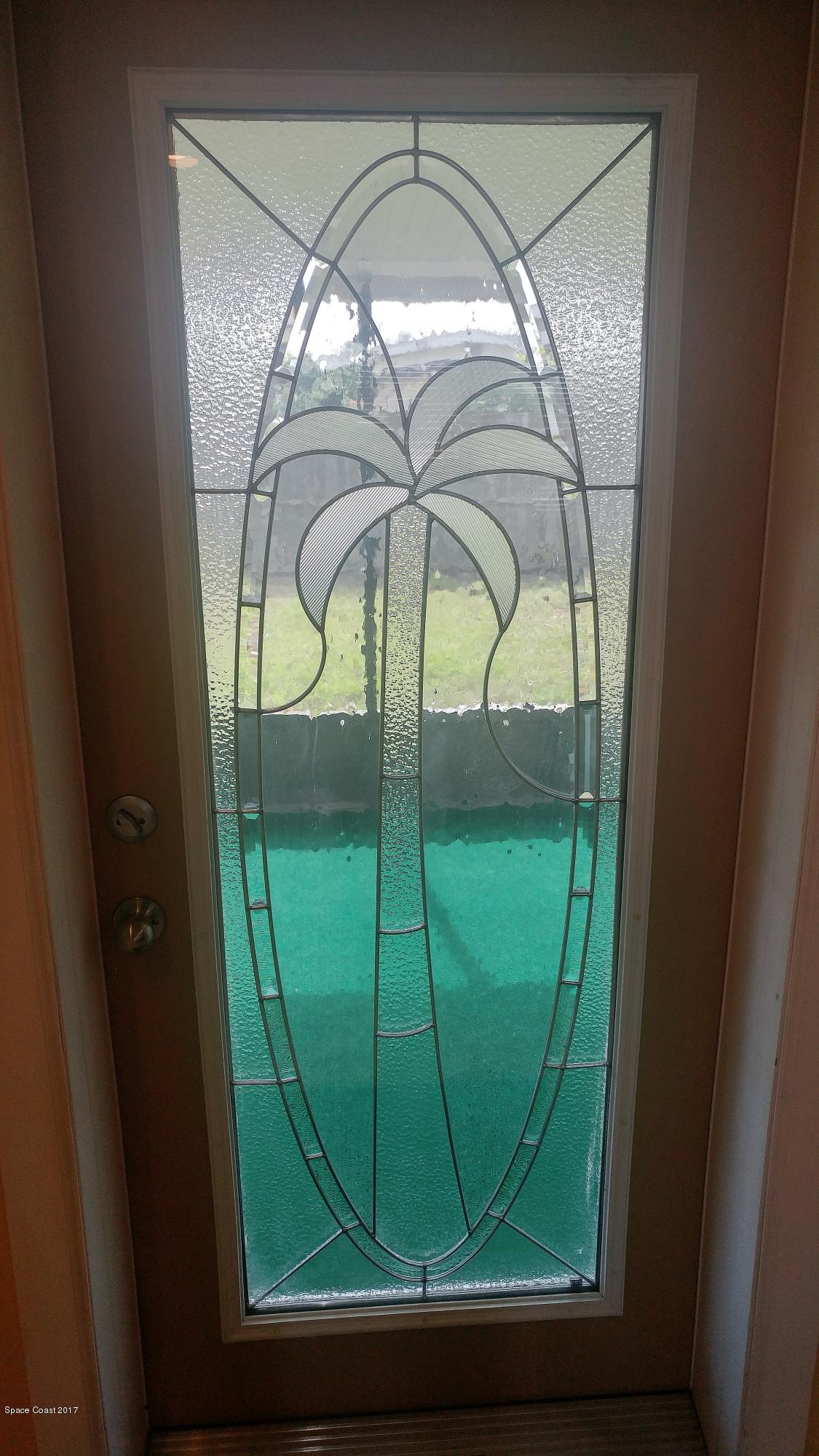 2857 Tropic Road Melbourne, FL 32935 - Photo 19 of 28 a view of a porch