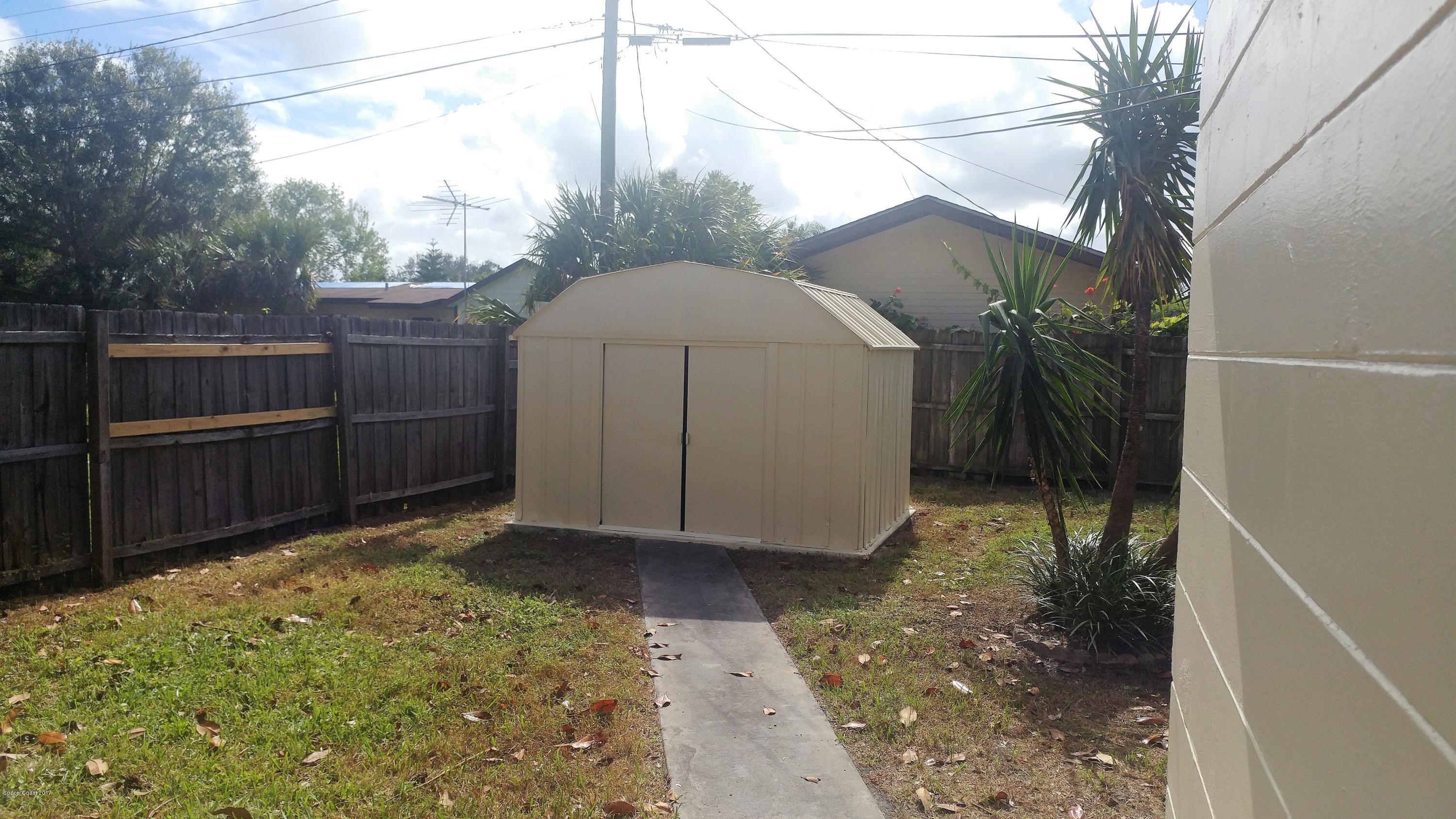 2857 Tropic Road Melbourne, FL 32935 - Photo 8 of 28 a view of a backyard