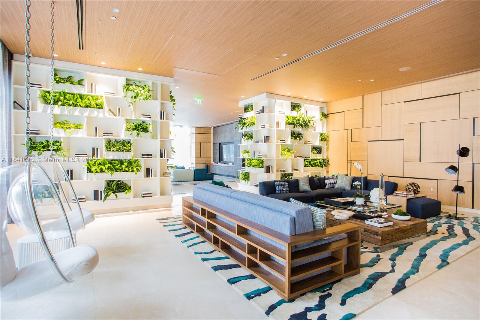 45 Southwest 9th Street, Unit 3803 Miami, FL 33130 - Photo 38 of 54 a large living room with large windows and furniture