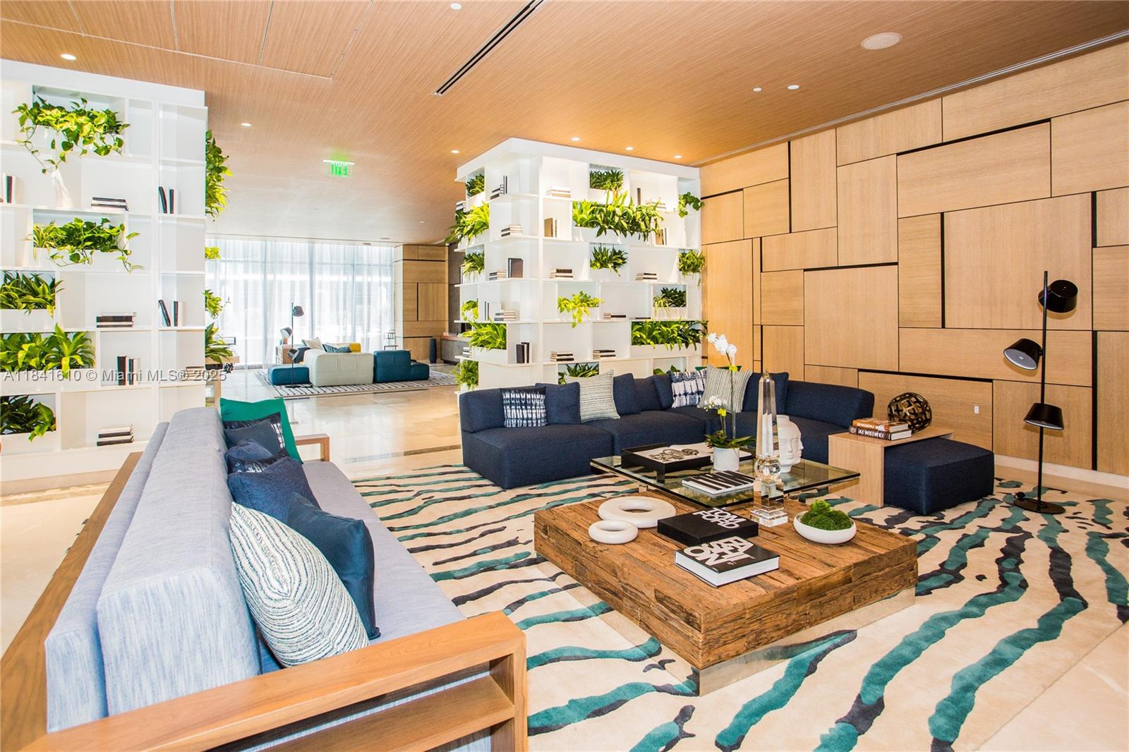 45 Southwest 9th Street, Unit 3803 Miami, FL 33130 - Photo 39 of 54 a living room with furniture and a chandelier