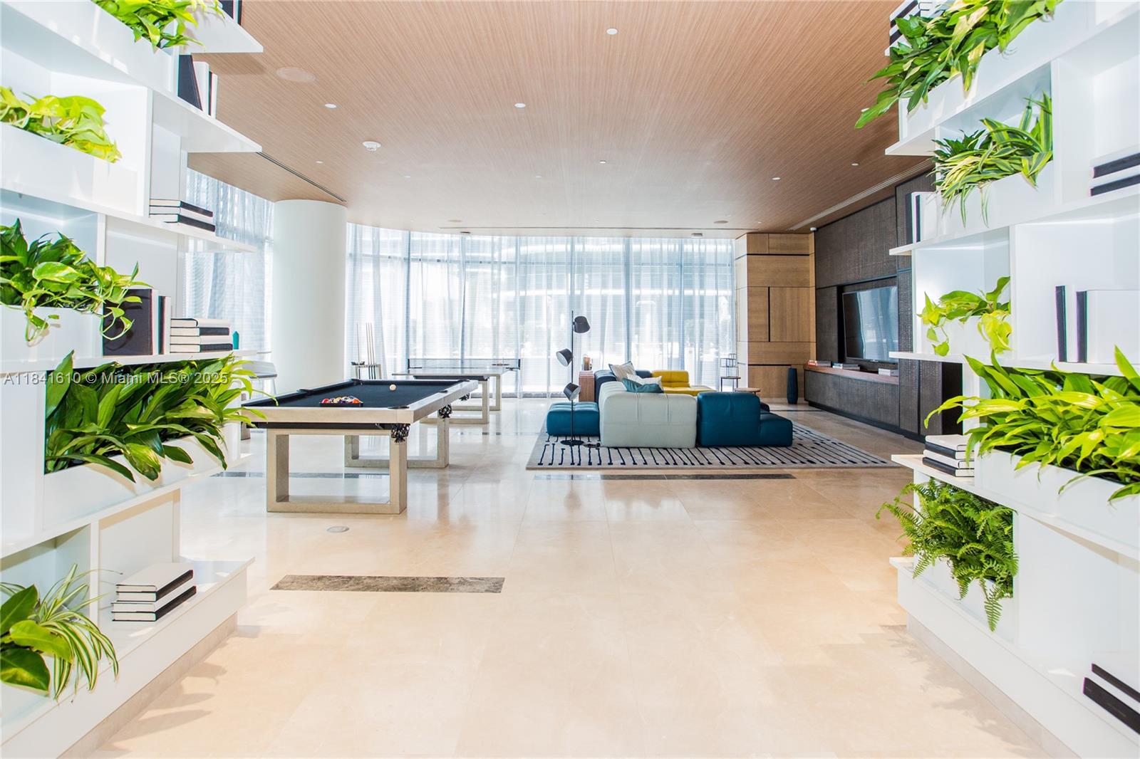 45 Southwest 9th Street, Unit 3803 Miami, FL 33130 - Photo 40 of 54 a living room with furniture potted plant and a large window
