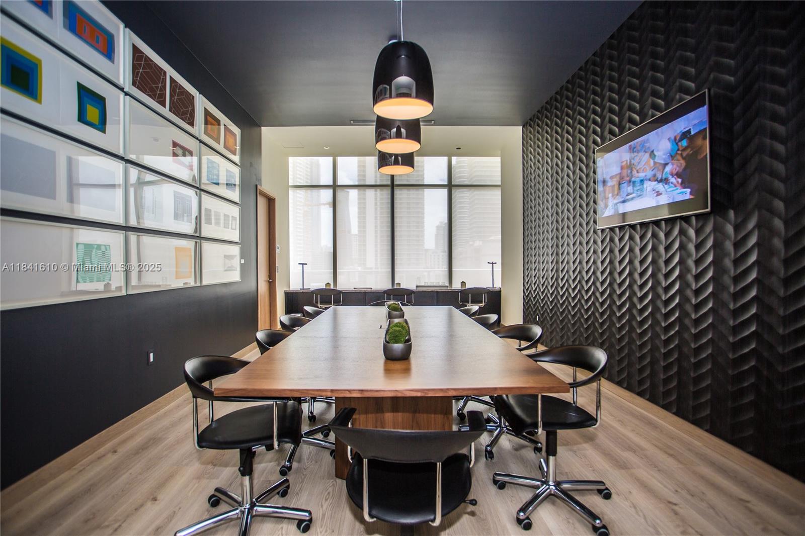 45 Southwest 9th Street, Unit 3803 Miami, FL 33130 - Photo 46 of 54 a view of a dining room with furniture window and wooden floor