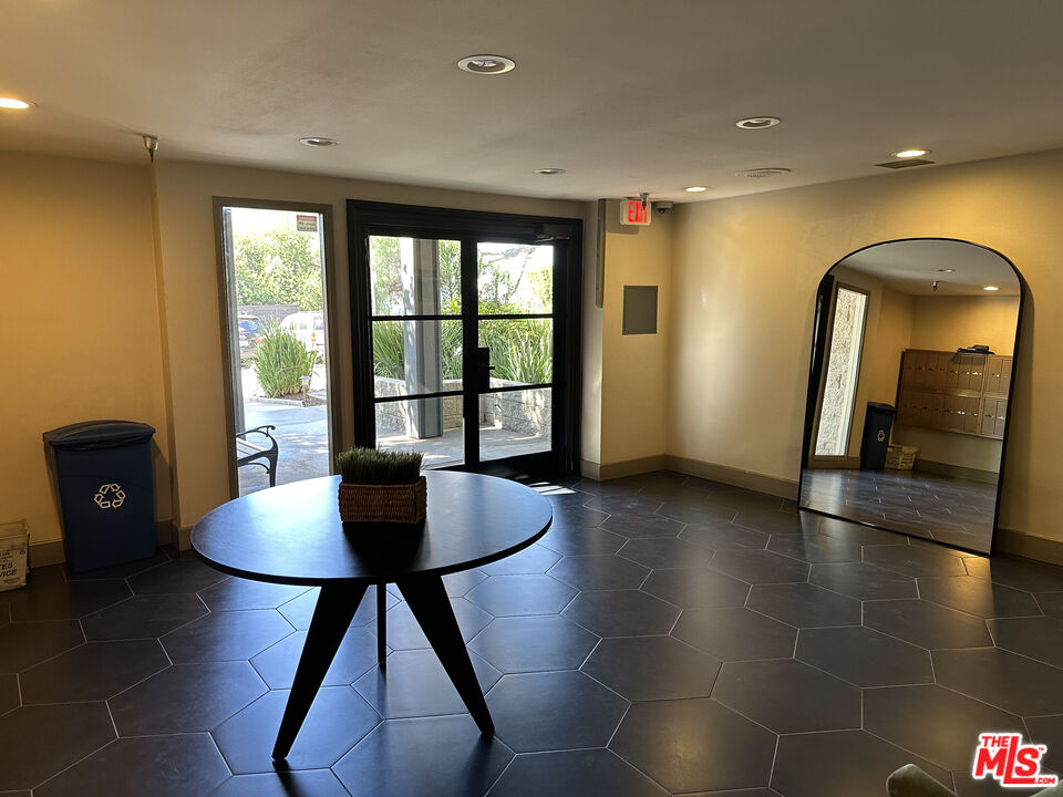 a view of a livingroom with furniture and window