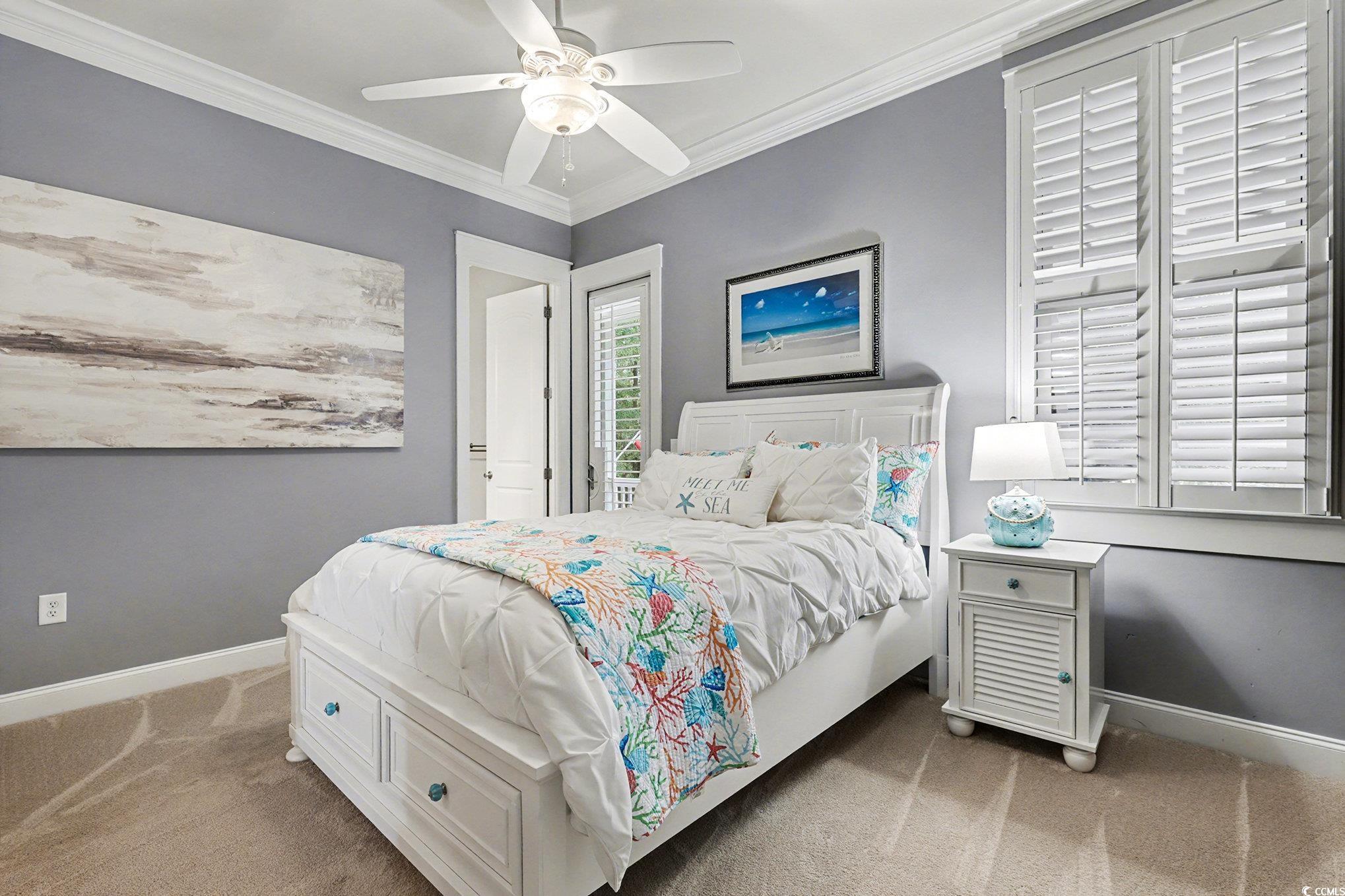 1710 Pond Road Murrells Inlet, SC 29576 - Photo 20 of 39 Bedroom with crown molding, carpet floors, and a ceiling fan