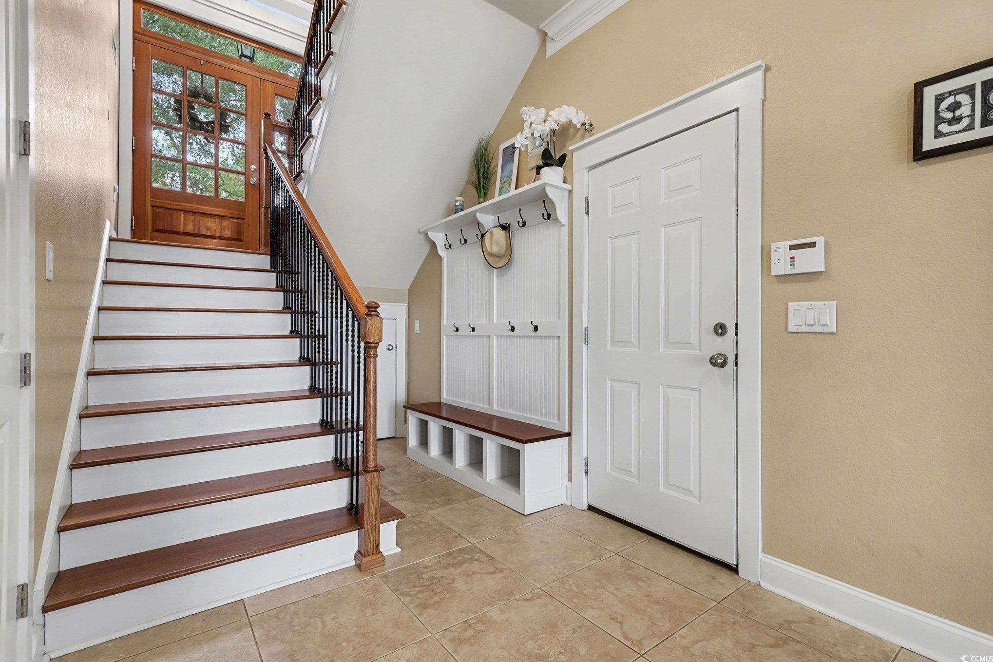 1710 Pond Road Murrells Inlet, SC 29576 - Photo 26 of 39 Mudroom with baseboards and light tile patterned flooring