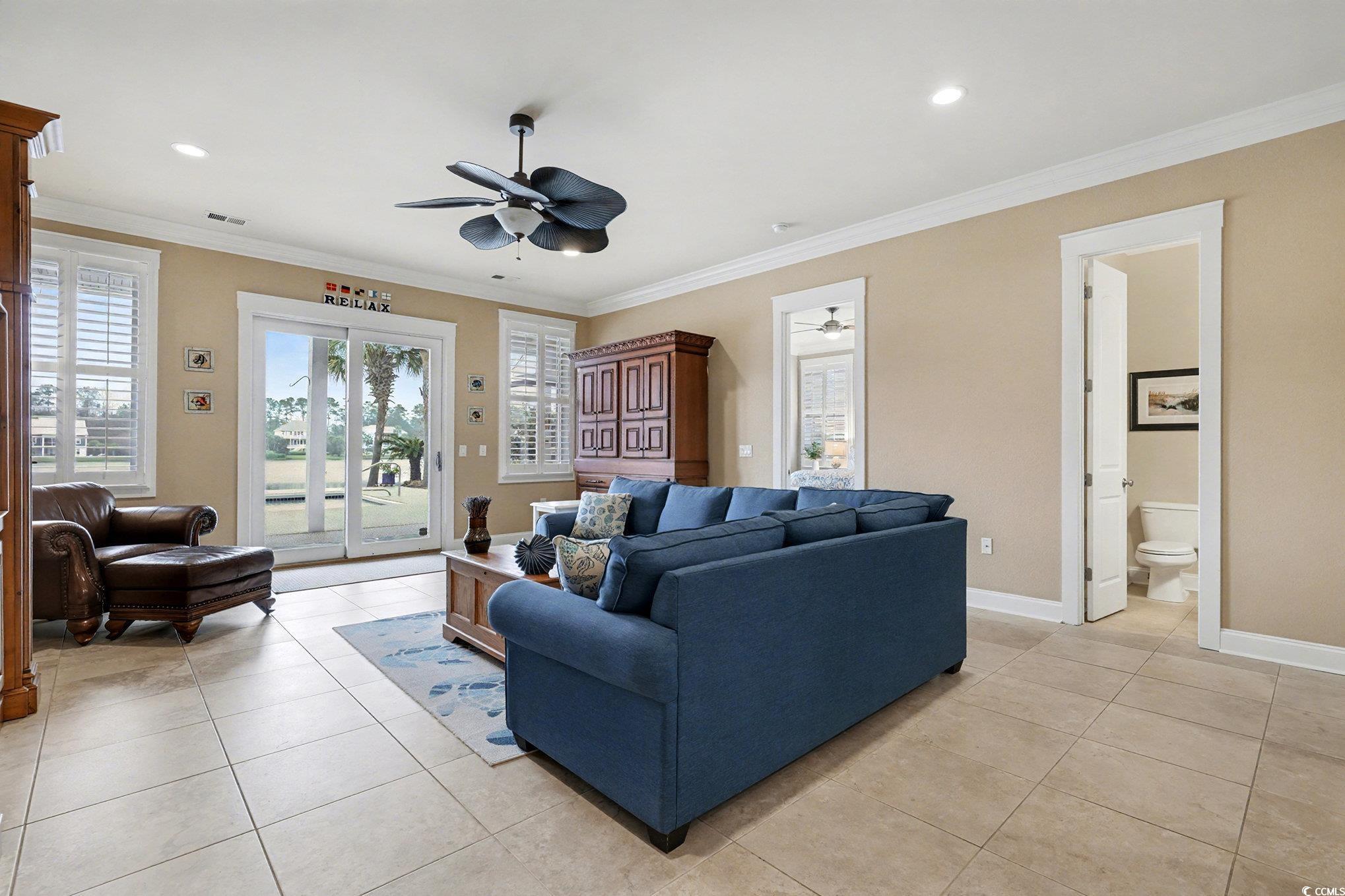 1710 Pond Road Murrells Inlet, SC 29576 - Photo 28 of 39 Living area with ornamental molding, ceiling fan, light tile patterned flooring, and recessed lighting