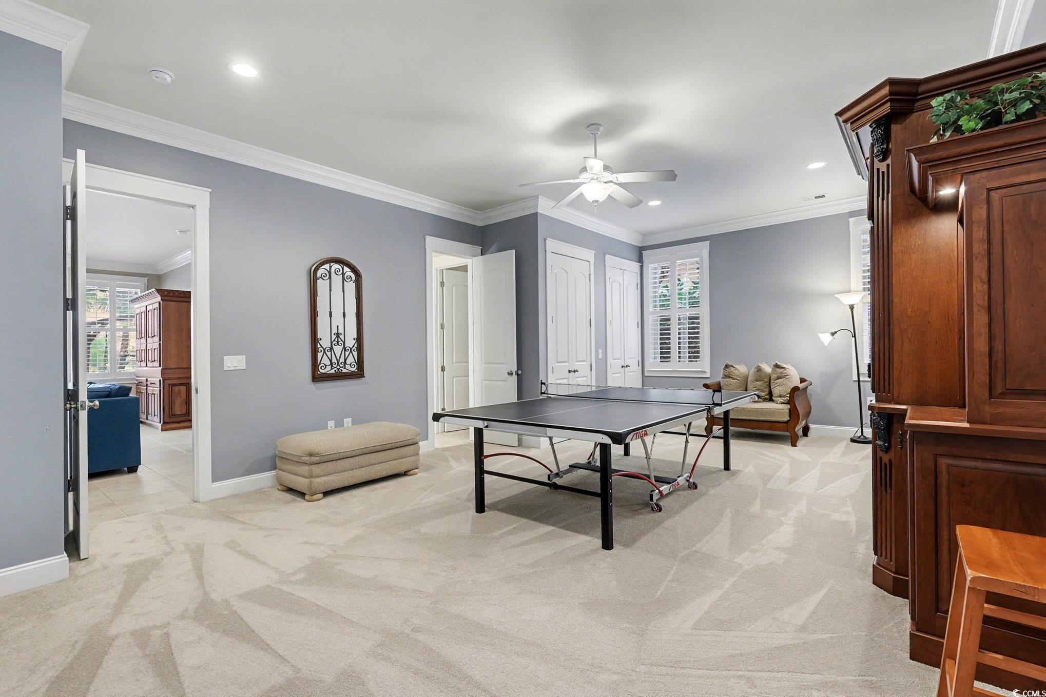 1710 Pond Road Murrells Inlet, SC 29576 - Photo 32 of 39 Rec room featuring ornamental molding, light carpet, a ceiling fan, and recessed lighting