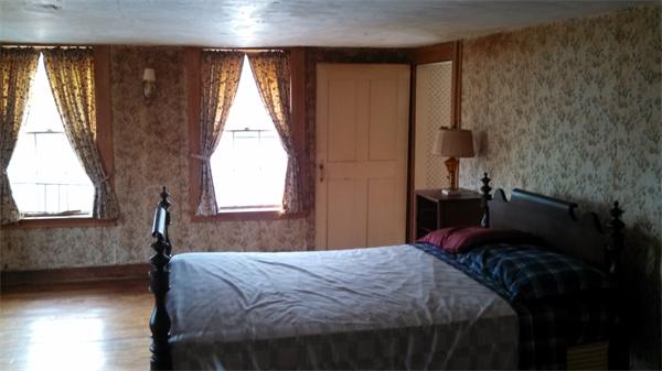 205 Mountain Road Princeton, MA 01541 - Photo 22 of 29 a bedroom with a bed and a window