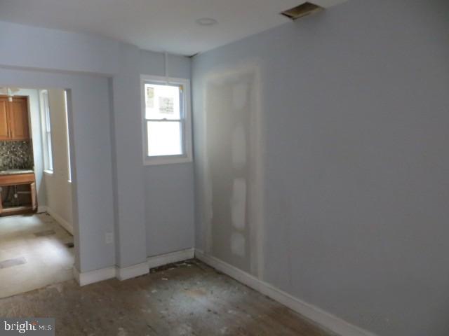 203 South Exeter Street Baltimore, MD 21202 - Photo 3 of 5 an empty room with windows
