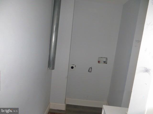 203 South Exeter Street Baltimore, MD 21202 - Photo 5 of 5 a bathroom with a shower