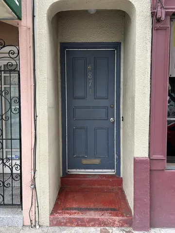 a view of storage and utility room with washer and dryer