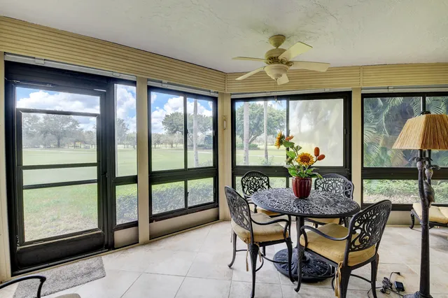 a view of a park with large trees