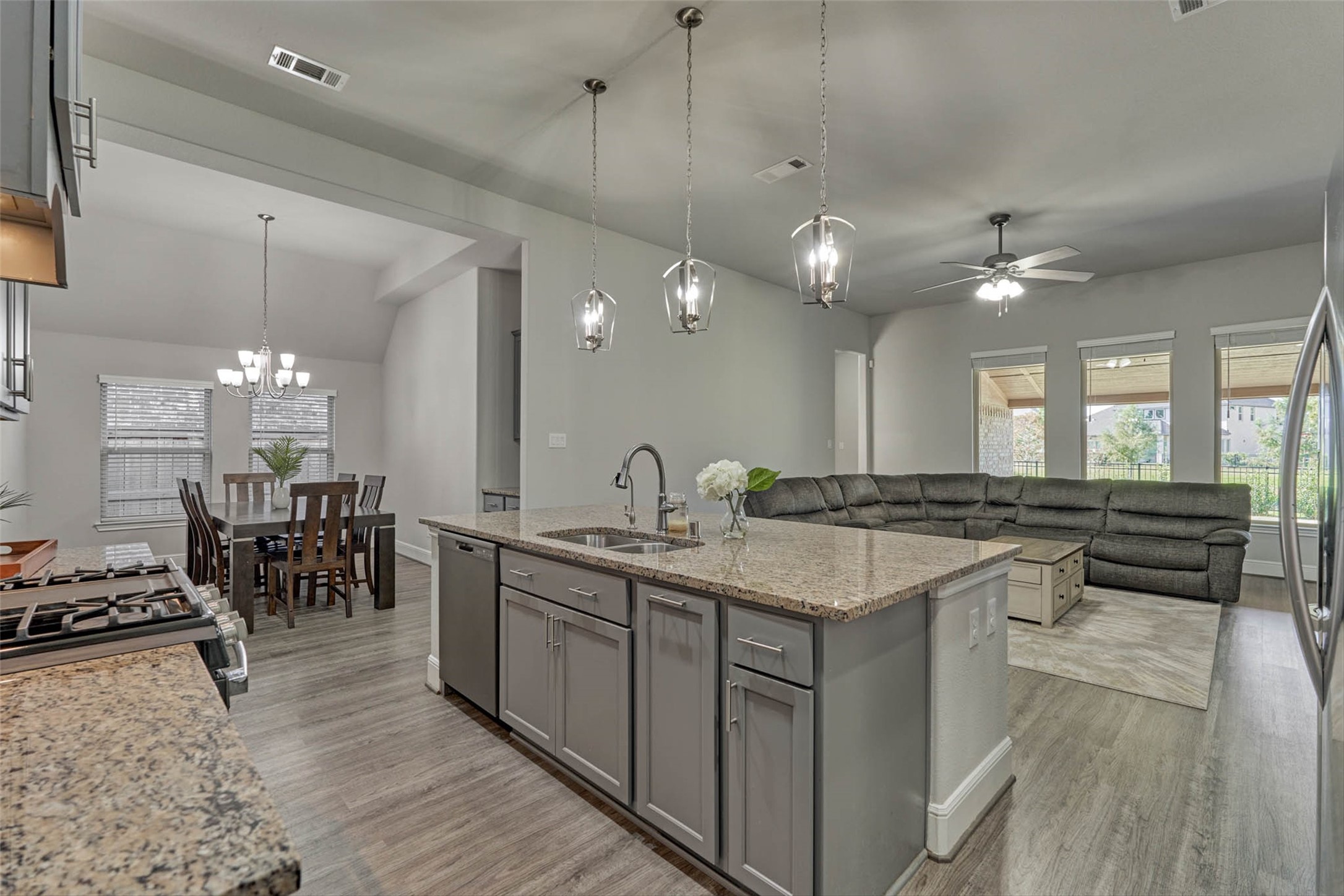 10660 Red Tail Place Conroe, TX 77385 - Photo 11 of 50 a kitchen with lots of counter top space and furniture