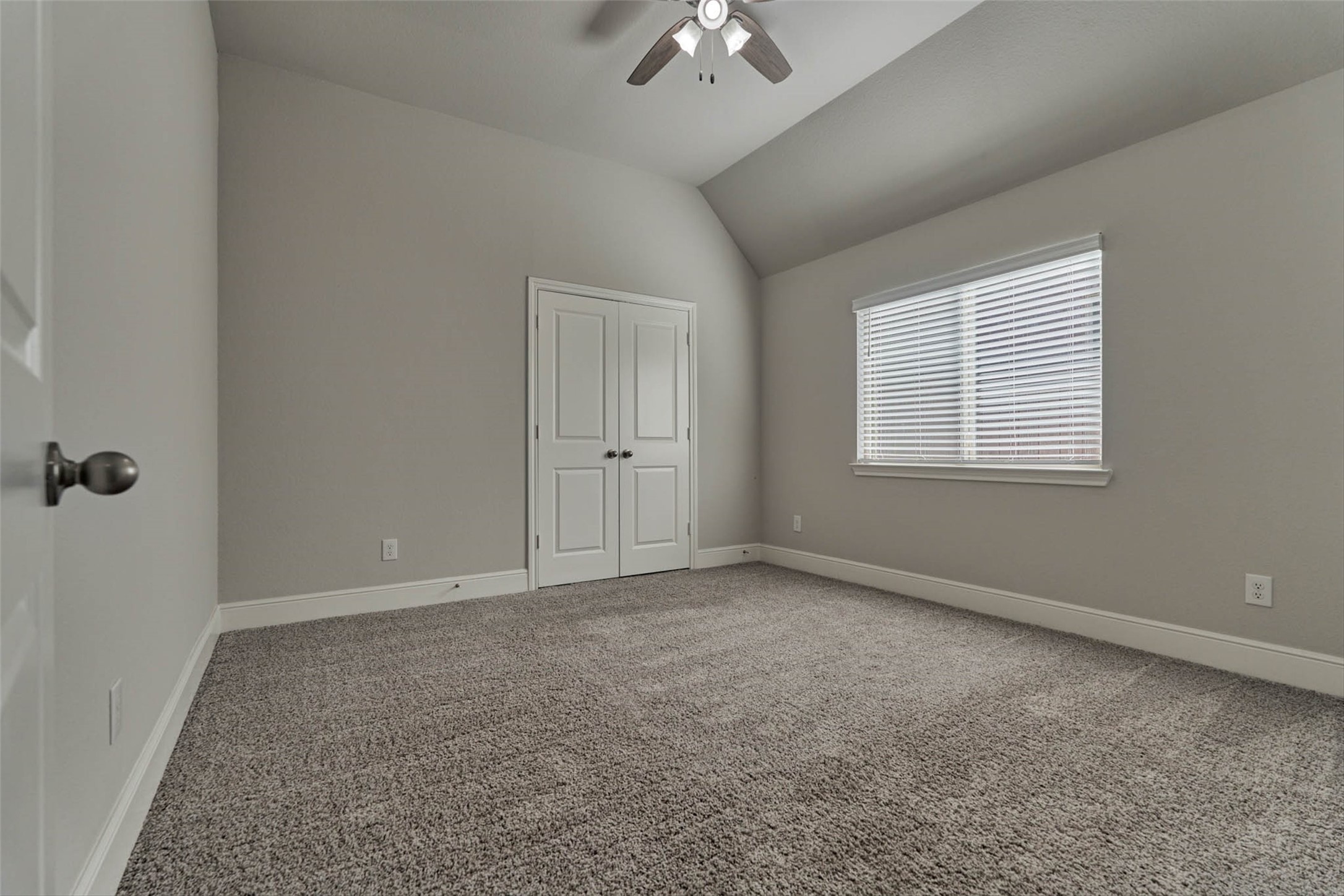 10660 Red Tail Place Conroe, TX 77385 - Photo 30 of 50 a view of an empty room with a window