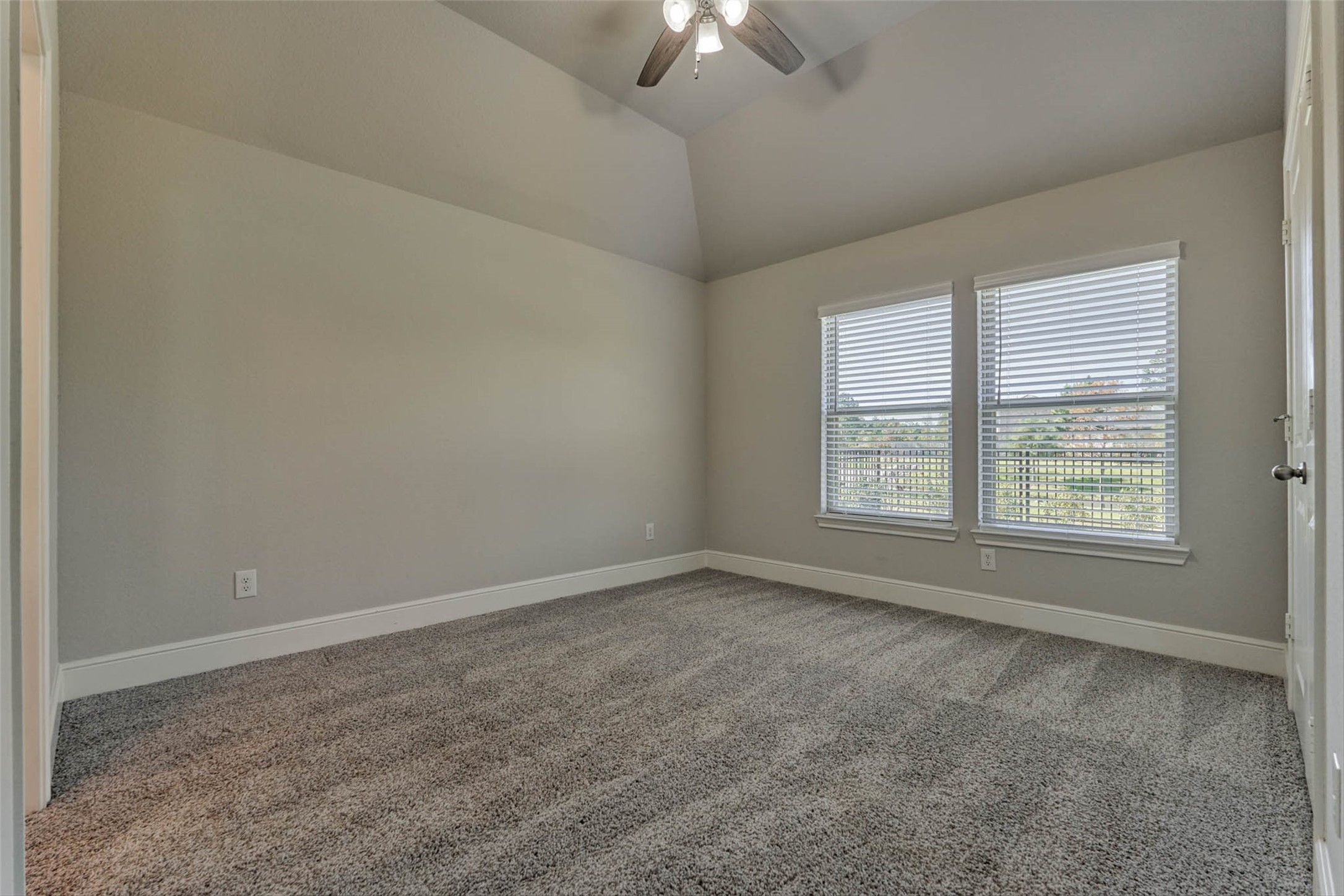 10660 Red Tail Place Conroe, TX 77385 - Photo 32 of 50 an empty room with a empty space and a window