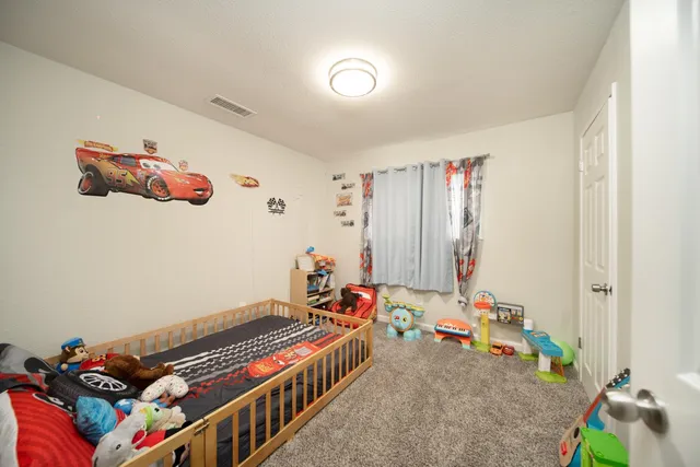 a room with furniture and toys