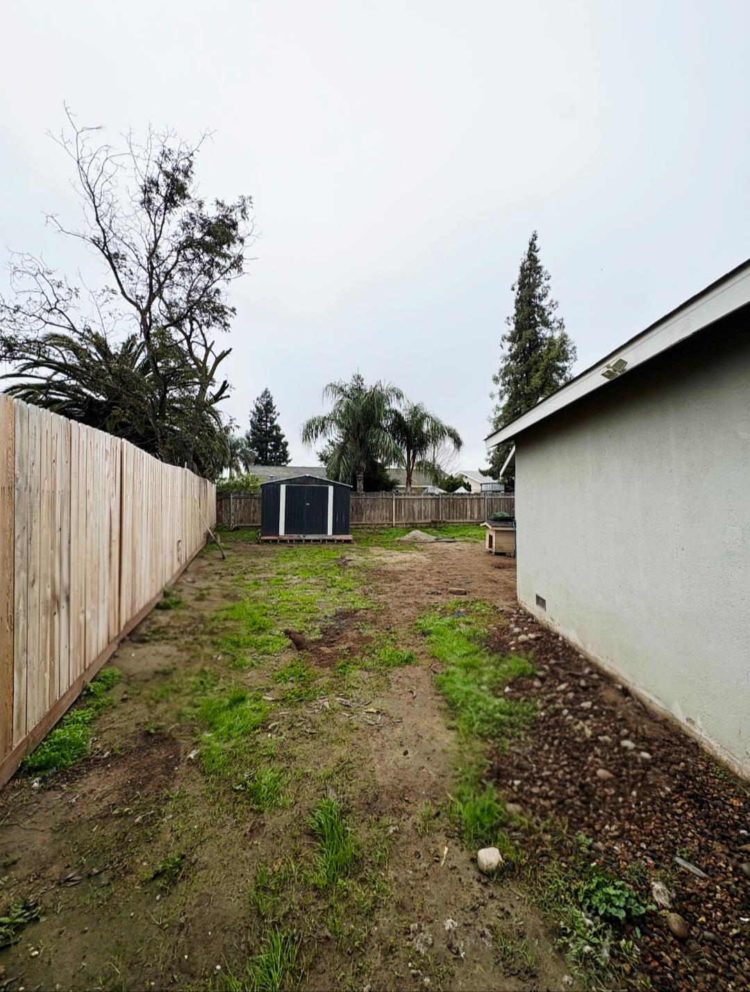 601 Summit Court Modesto, CA 95357 - Photo 14 of 17 a view of a backyard with pathway