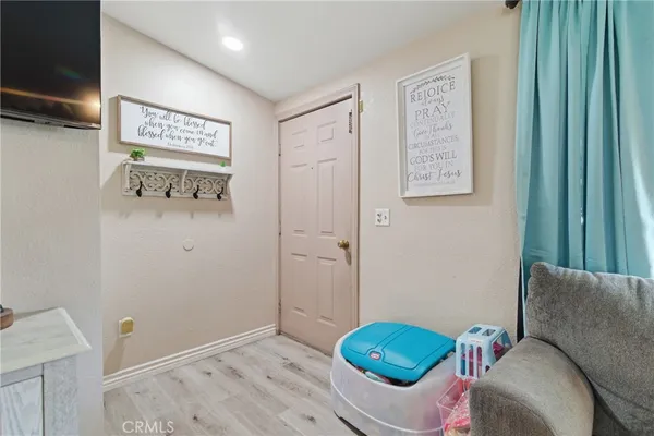 a bedroom with a bed and furniture