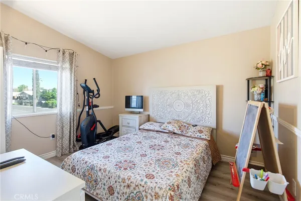 a bed room with a bed and a window