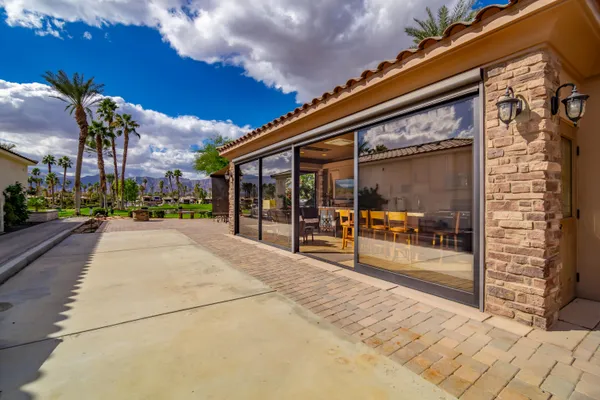 a view of a building with a glass door
