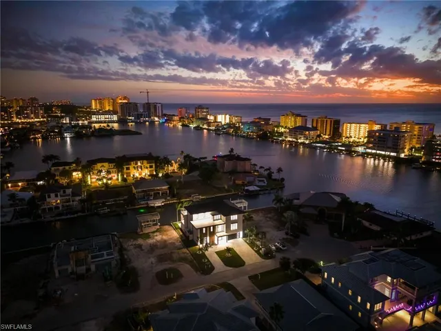 a view of swimming pool with outdoor seating