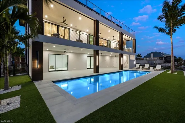 a view of swimming pool from a balcony