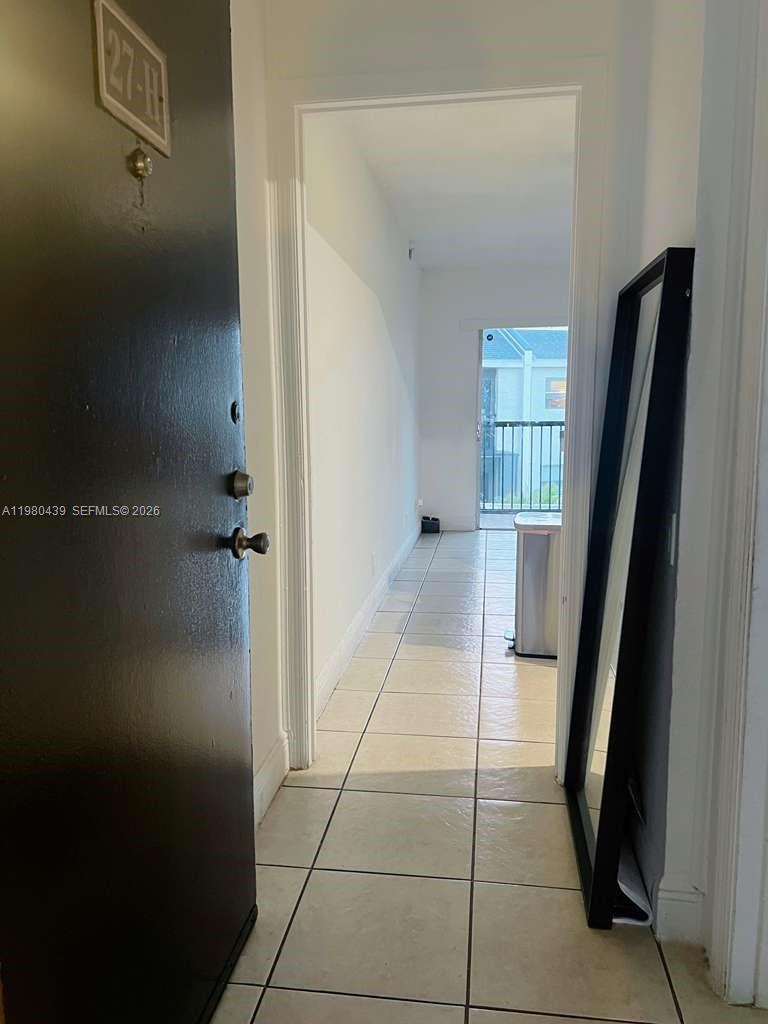 4435 Treehouse Lane, Unit H Tamarac, FL 33319 - Photo 5 of 18 a view of entryway with window