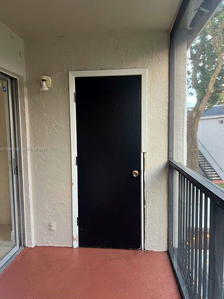 4435 Treehouse Lane, Unit H Tamarac, FL 33319 - Photo 8 of 18 a view of balcony